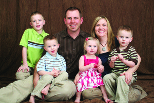 Daughter Nicole (Glanzer g’99) Quiring with her husband Jason (g’98) and, from left, Ian, Carter, Tatum and Coleson