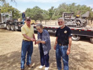 Bob and Connie Kroeker sell a Holt tractor and give the proceeds to Tabor College 