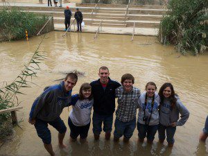 Students at Jordan River on Holy Land Trip