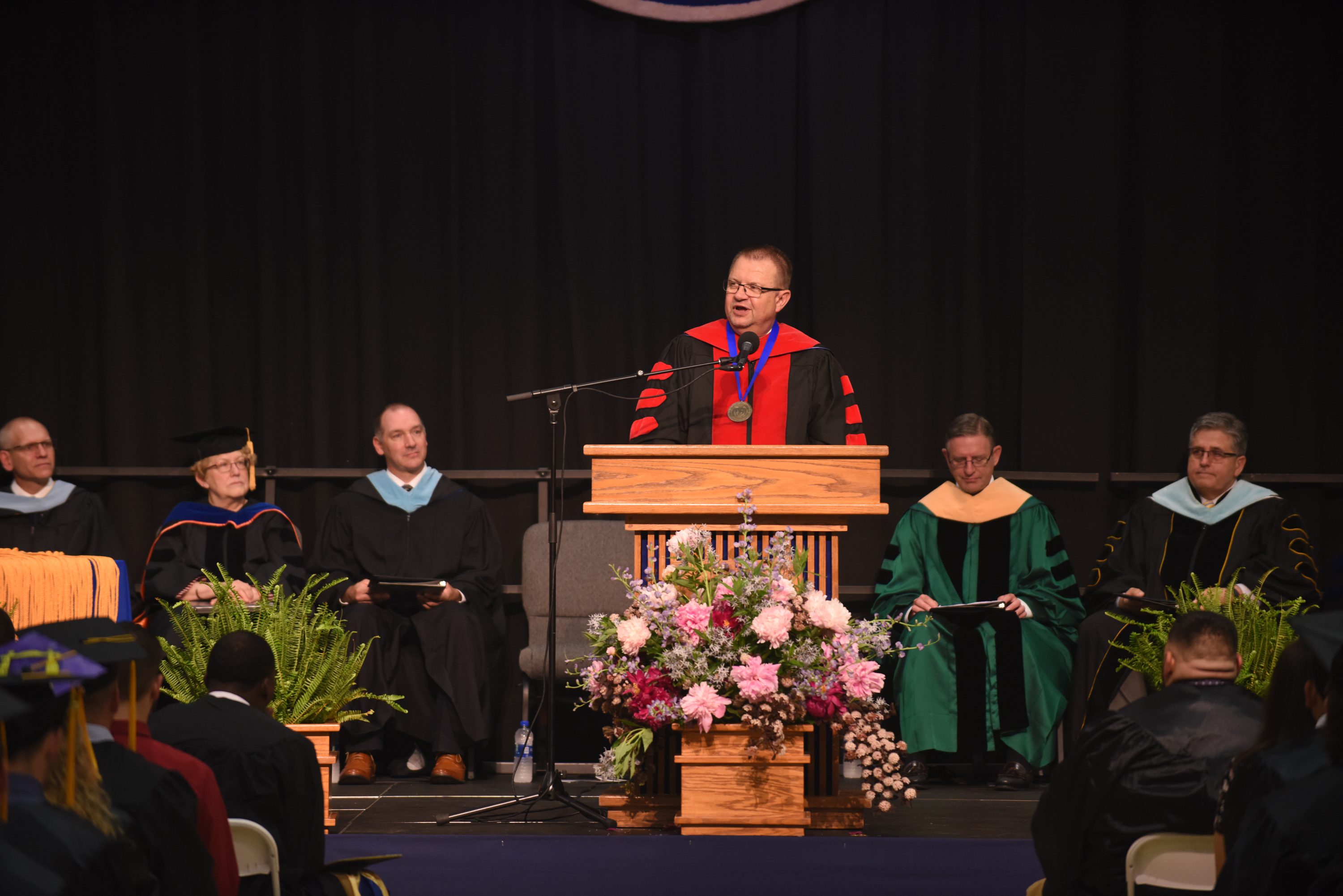 President Jules Glanzer addresses students at commencement