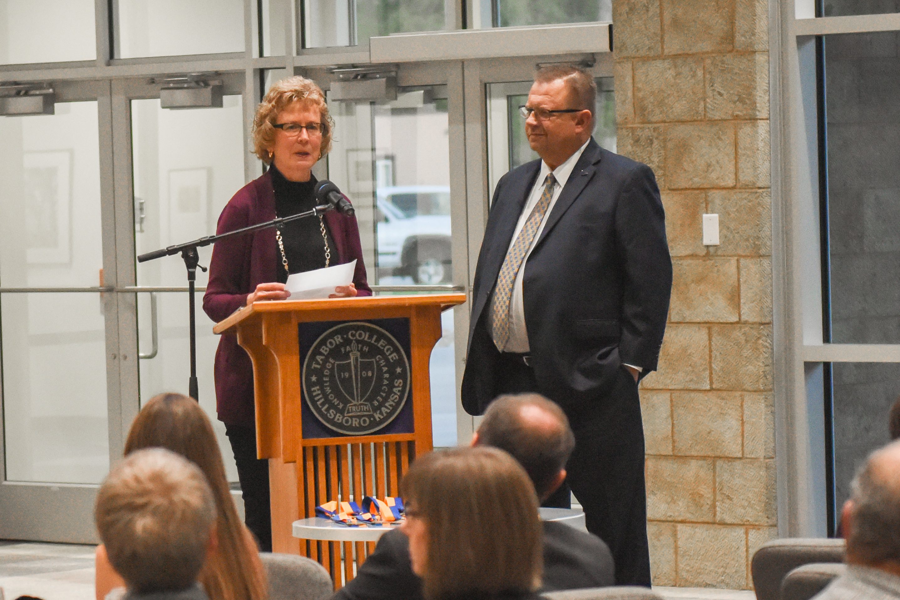 Judy Hiebert accepts Alumni Merit Award