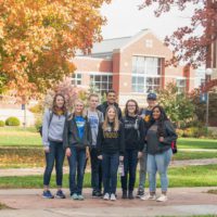 Student standing on campus