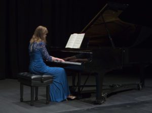 Shelia Litke playing piano