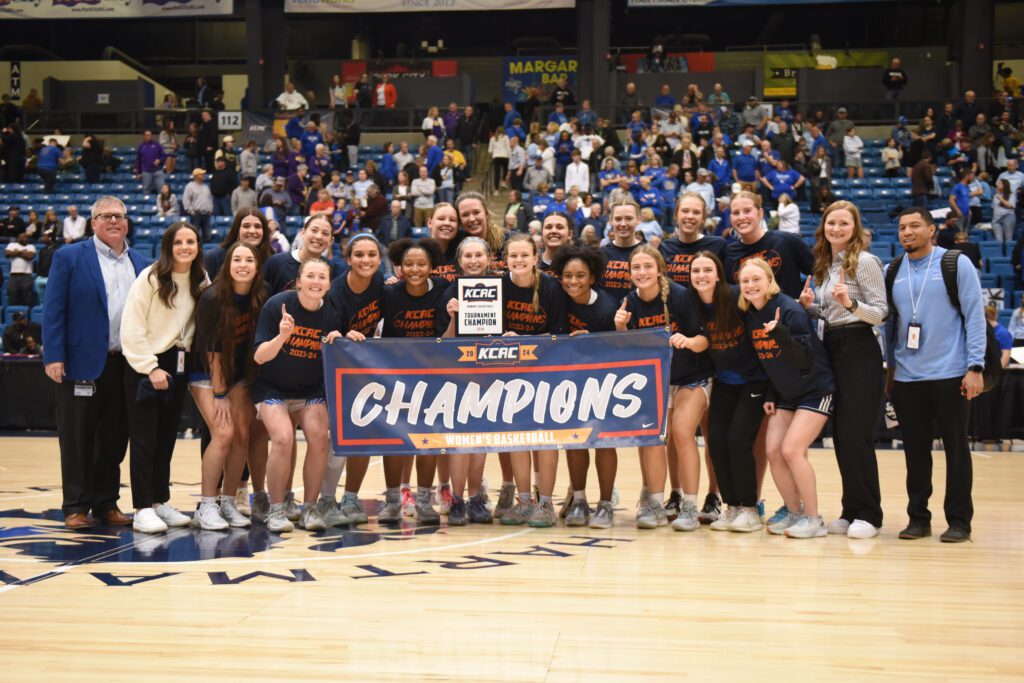 Tabor WBB poses with trophy as they prepare for nationals