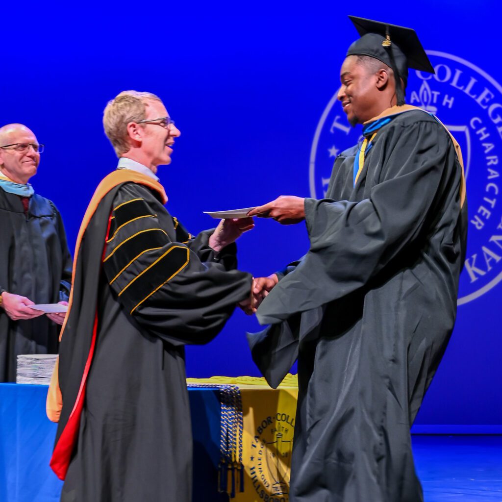 President David Janzen with Montel Stewart at Commencement