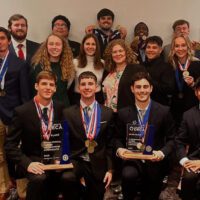 Tabor DECA students at national competition